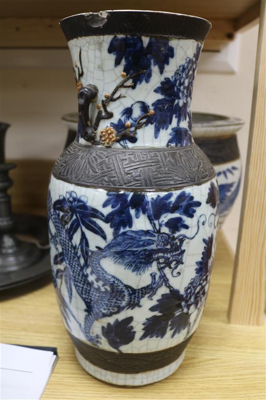 A Chinese blue and white crackleglaze jardiniere and two vases